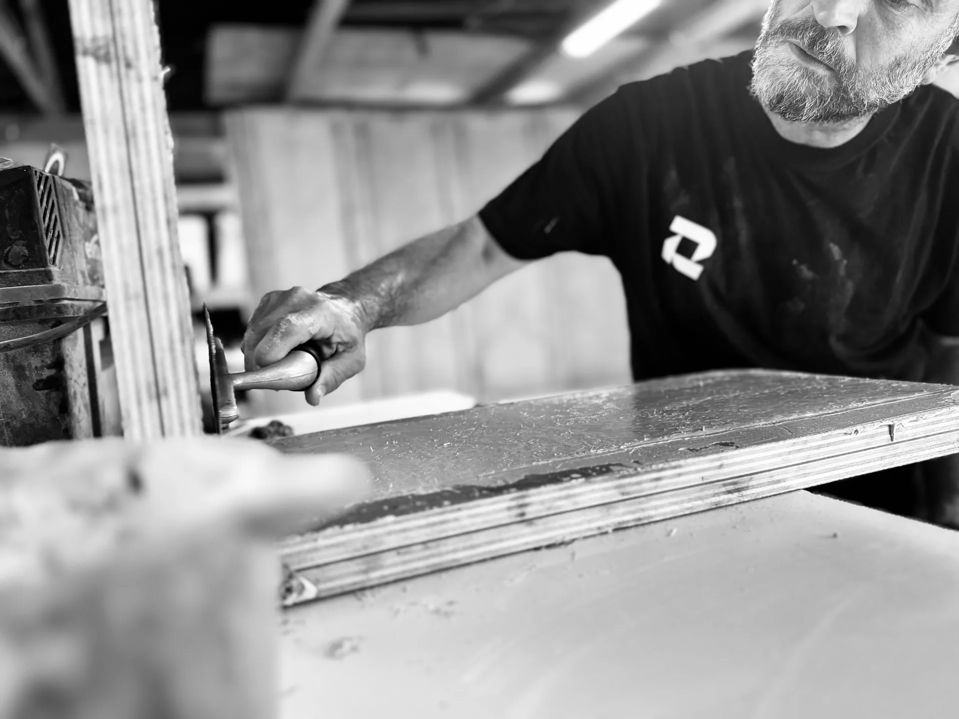 Cutting a cast concrete panel on a workbench